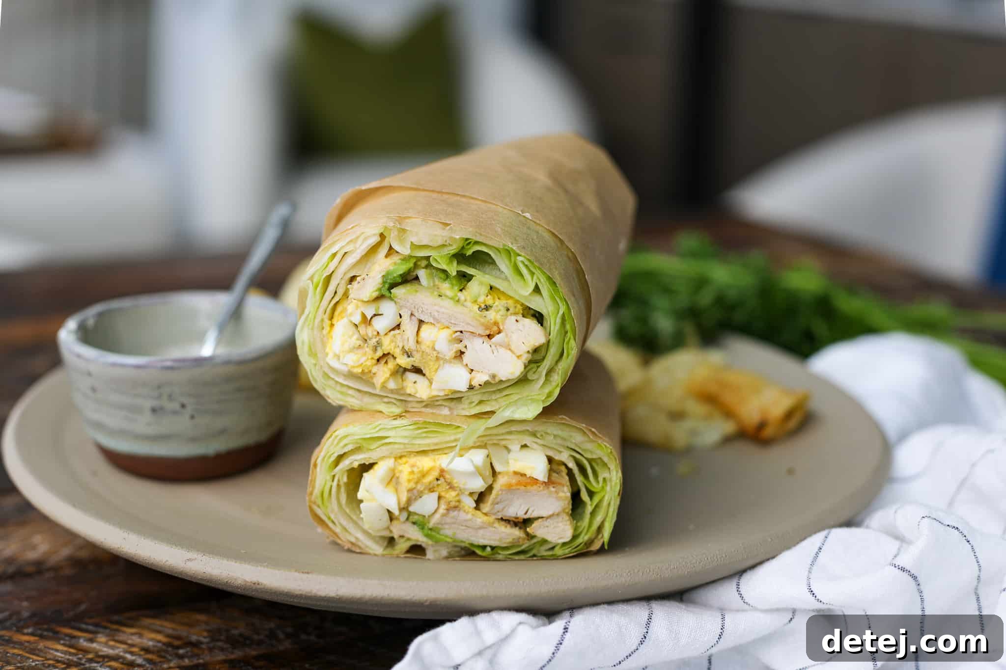 Emperor's Caesar Chicken Wrap 4 Stacked Chicken Caesar Salad Wraps, ready to be served.