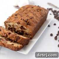 A freshly baked loaf of chocolate chip banana bread.