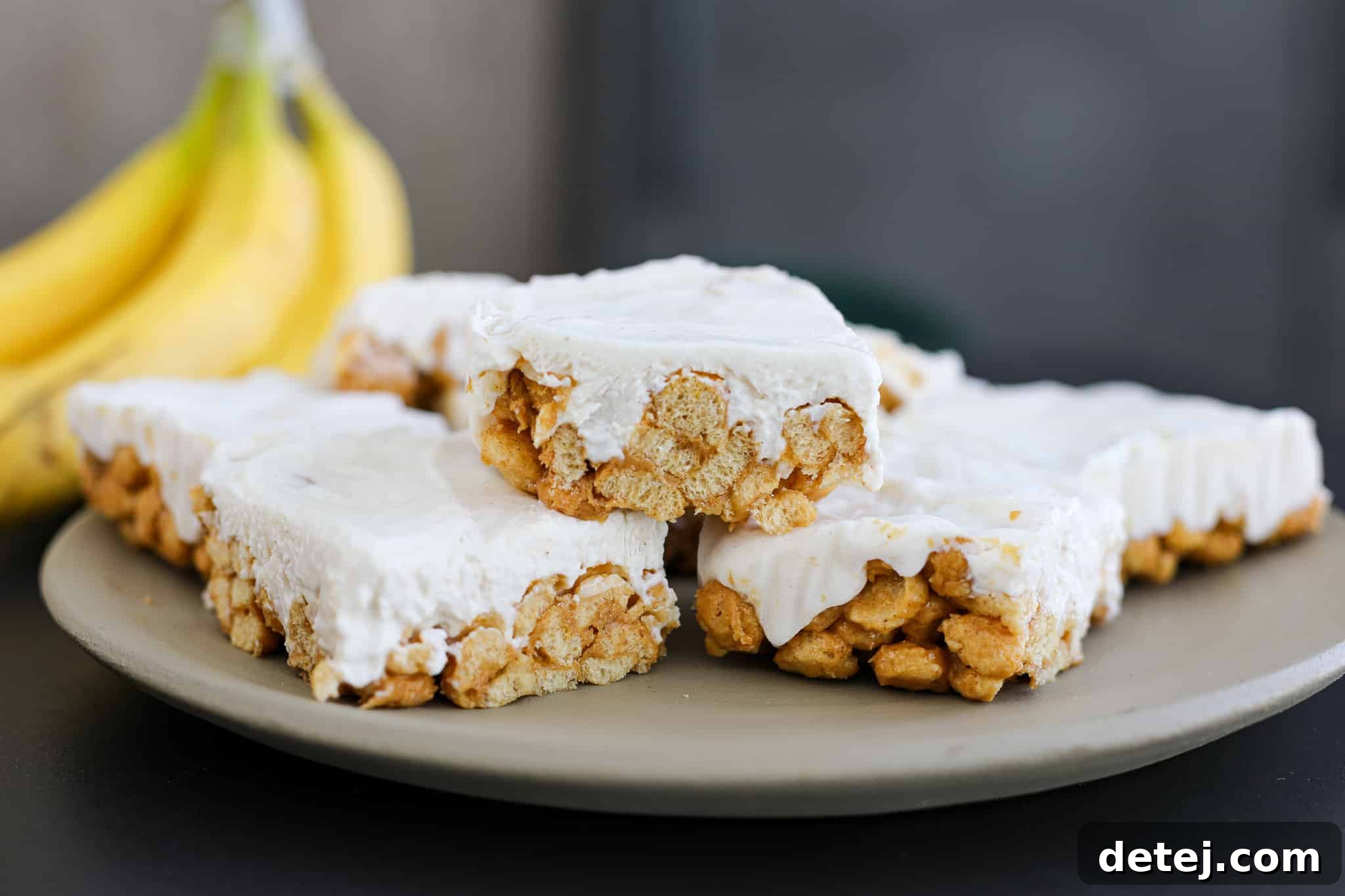 Delicious Five-Ingredient Frozen Yogurt Breakfast Bars with cinnamon cereal base, peanut butter, honey, and vanilla yogurt. Perfect for a healthy breakfast or snack.