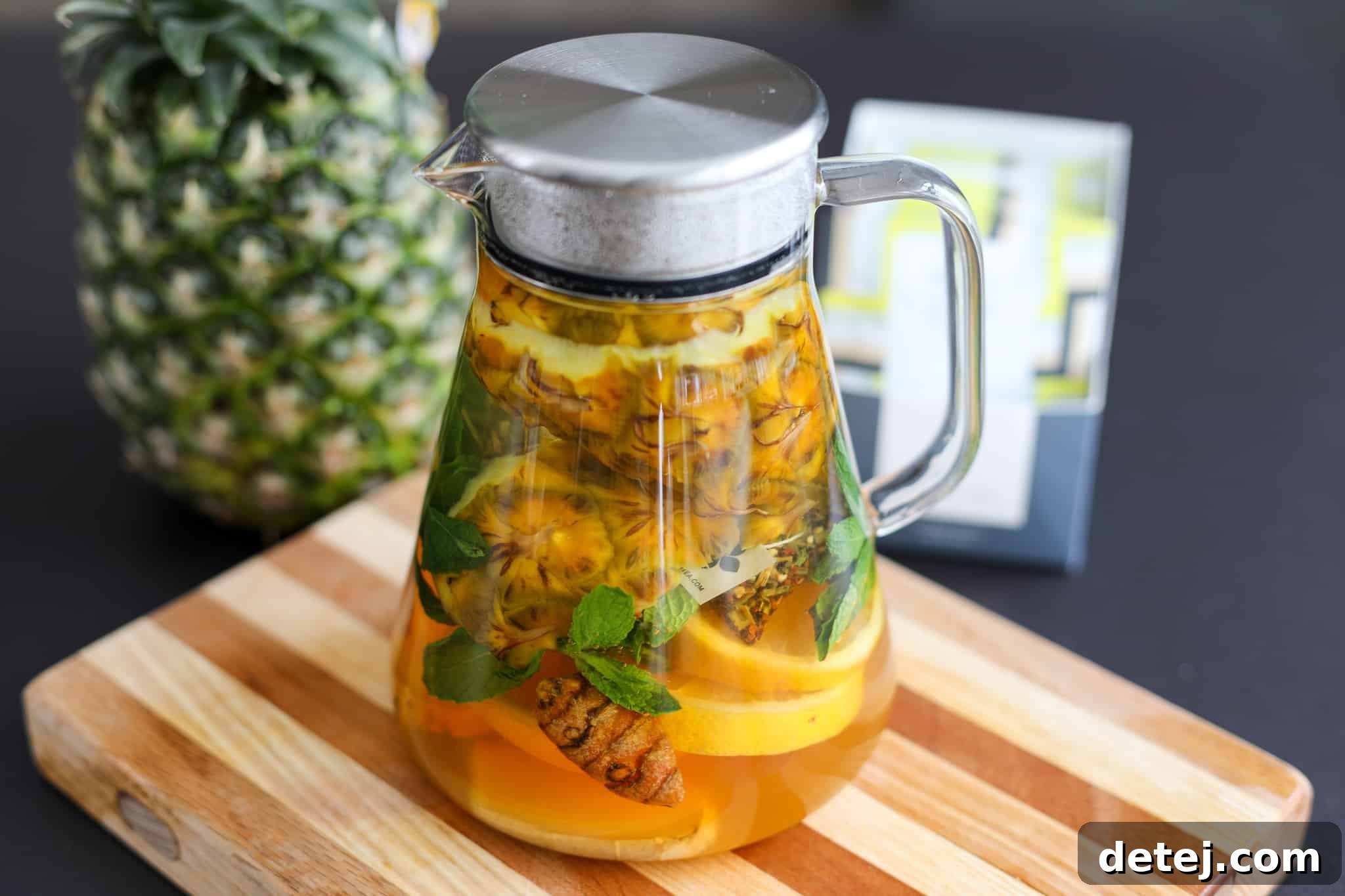Pineapple Rind Infusion 3 Close-up of fresh pineapple peel and ginger, key ingredients for brewing a healthy infused tea.