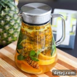 A close-up shot of Pineapple Peel Infused Tea, emphasizing its rich color and natural ingredients.
