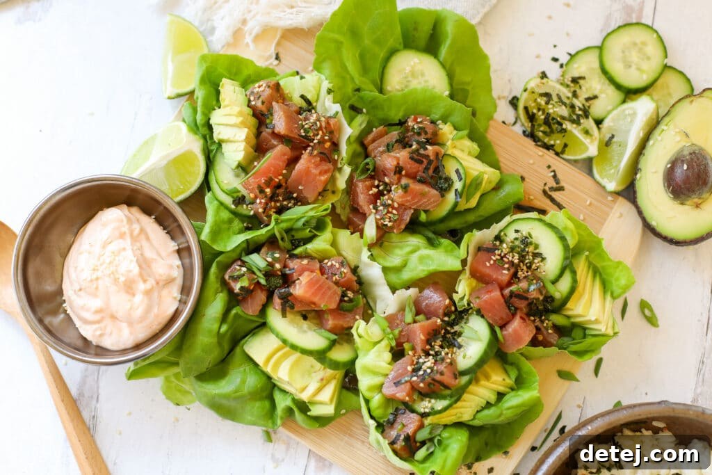 Delicious Tuna Poke served in fresh lettuce cups for a healthy meal.