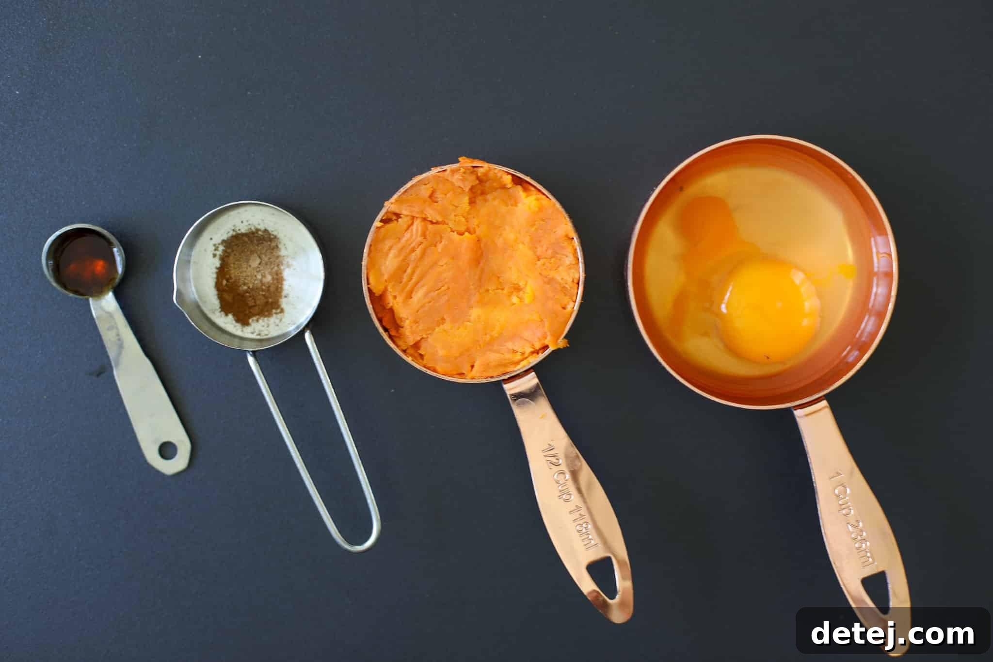Ingredients for Healthy Sweet Potato Pancakes laid out on a surface.