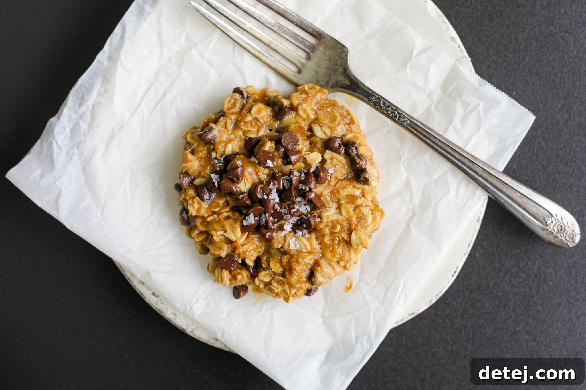 Flourless Peanut Butter Oatmeal Cookie for One 5 A perfectly baked single-serving flourless peanut butter oatmeal cookie, beautifully plated and ready for enjoyment, highlighting its irresistible texture.