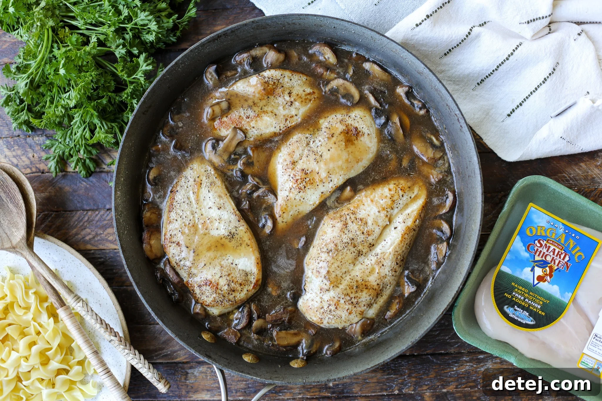 skillet chicken with mushroom gravy next to Smart Chicken package. 