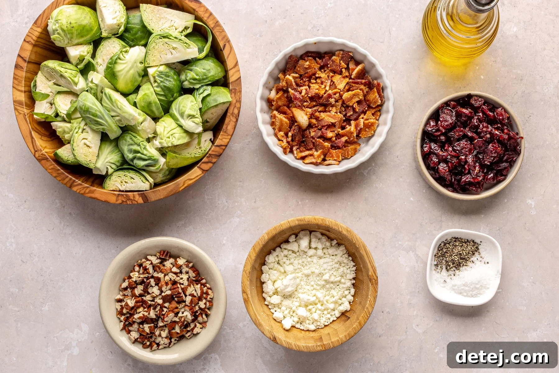 Two plates of Brussels Sprouts with Bacon, Pecans, Cranberries, and Goat Cheese, ready to be served.