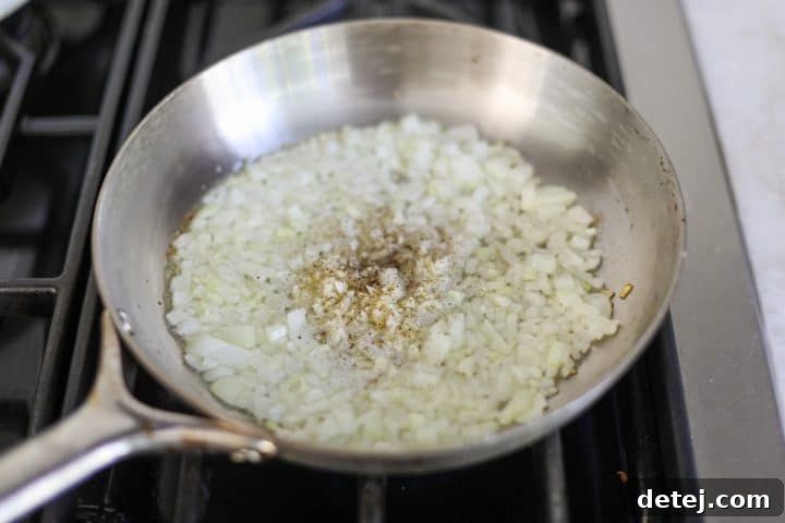 sautéed onions and garlic in a pan, turning translucent.