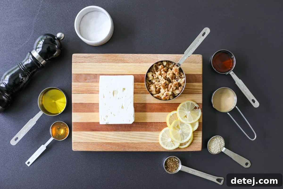 All the fresh ingredients meticulously arranged for the baked feta with honey and sticky walnuts recipe.