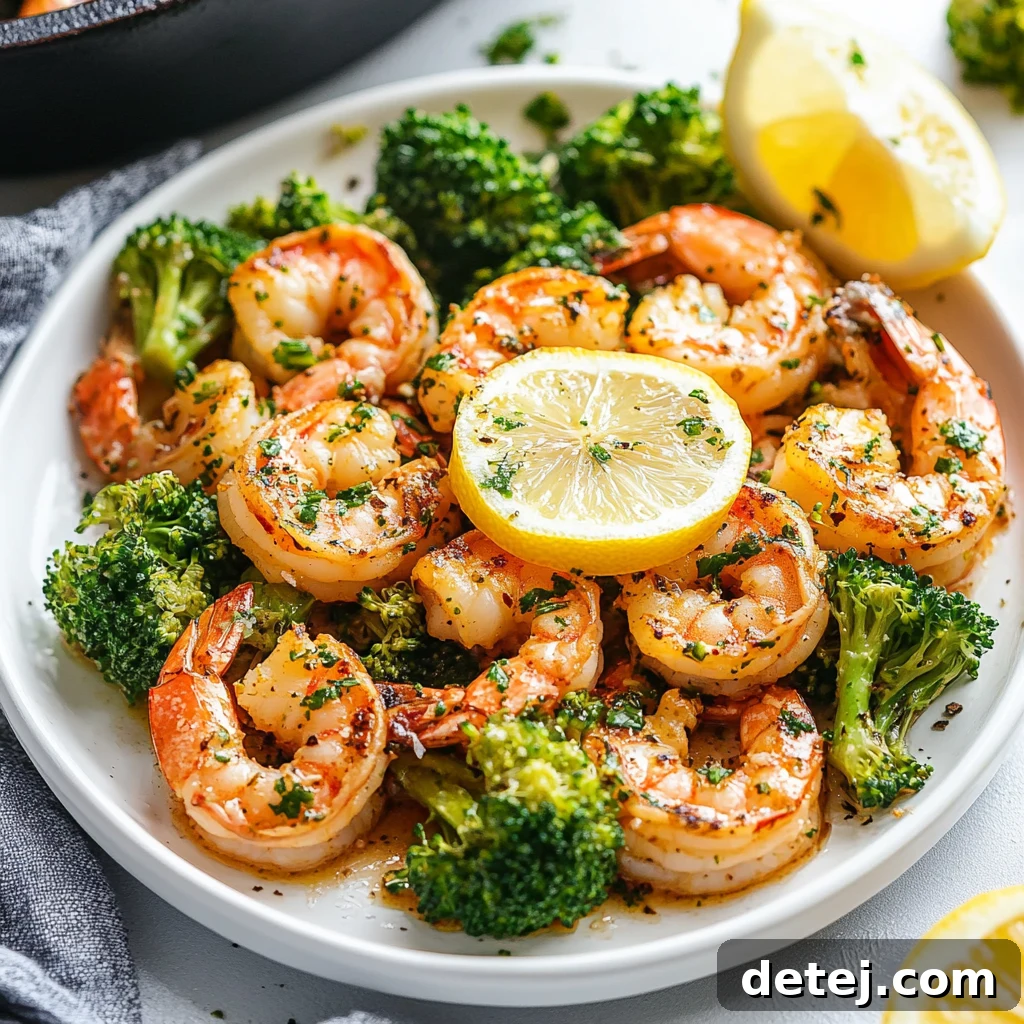 Garlic Butter Shrimp and Broccoli served elegantly on a plate with fresh herbs