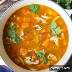 butternut squash and chicken soup in a dutch oven.