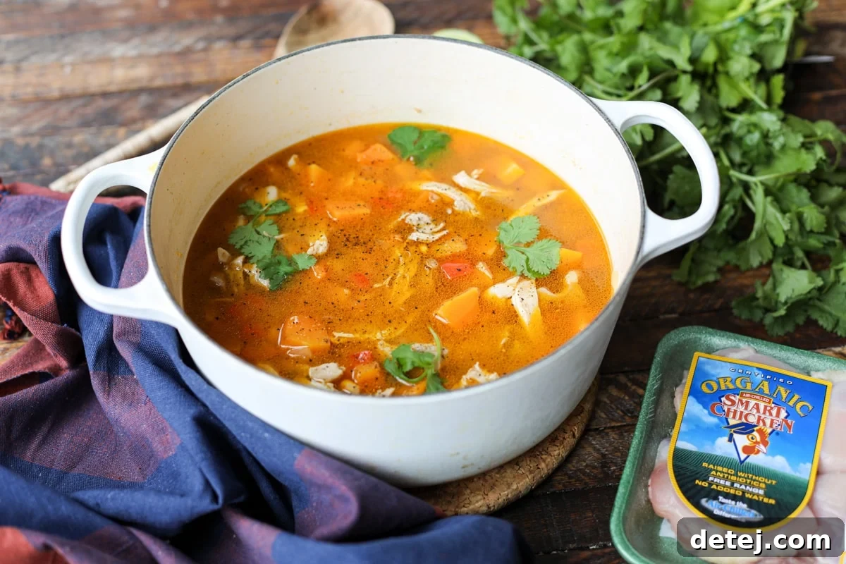 soup in a pot with Smart Chicken packaging nearby.