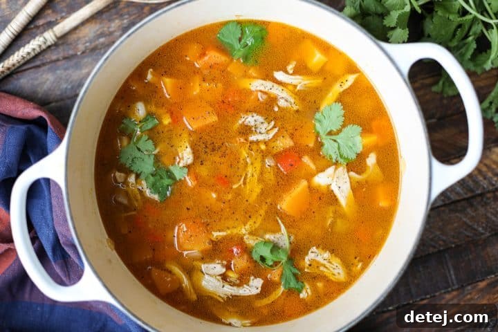 butternut squash and chicken soup in a dutch oven.