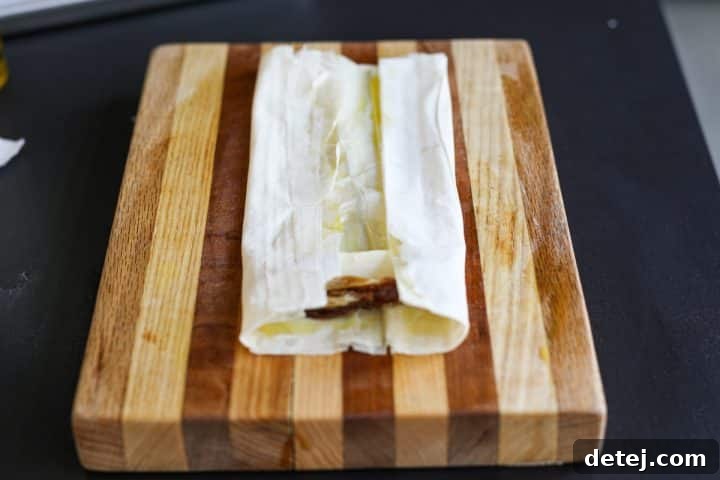 The sides of the phyllo dough expertly folded inwards over the brie and dates, creating a secure parcel