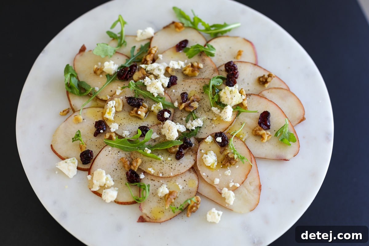 pear carpaccio on a plate.