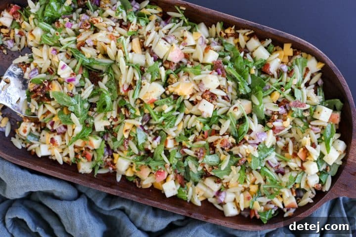 A final shot of the Chopped Fall Pasta Salad in a beautiful serving bowl, garnished and ready to be enjoyed.