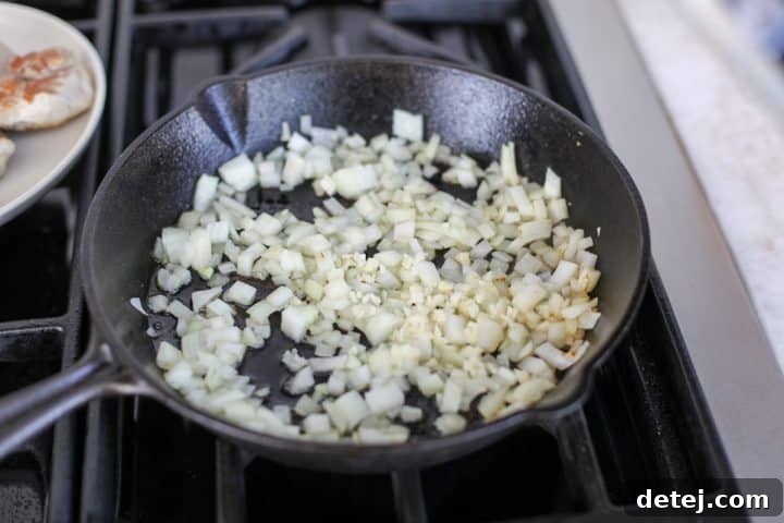 diced onion and garlic sautéing.