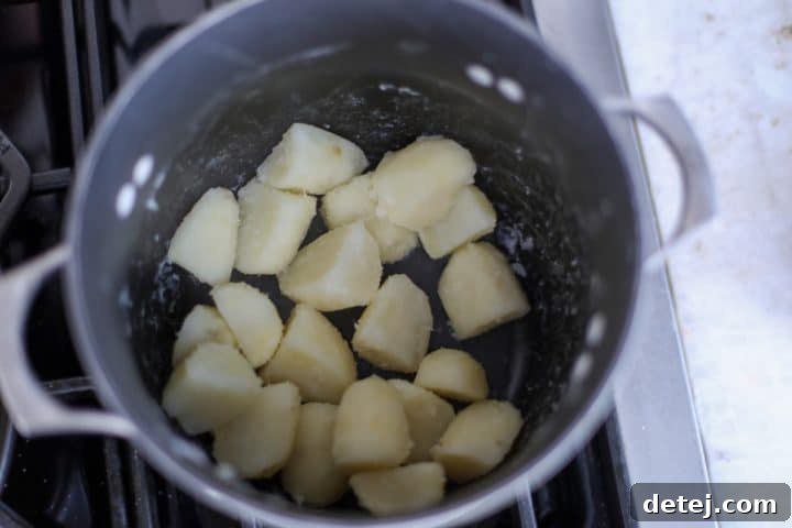 potatoes drained and roughed up edges.