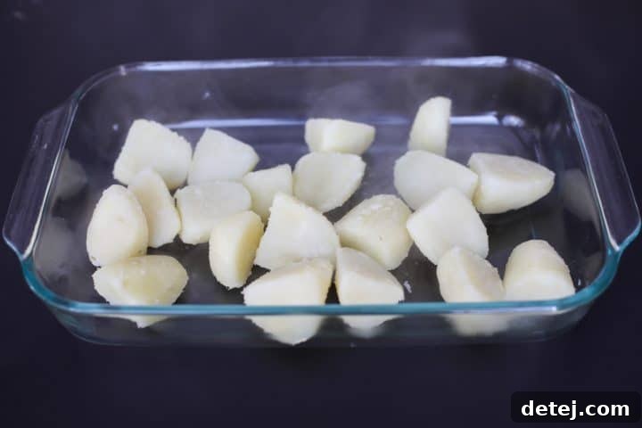 potatoes in prepared baking dish.