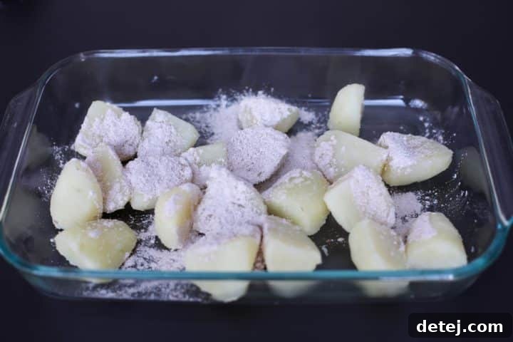 cornstarch and spices over drained potatoes.