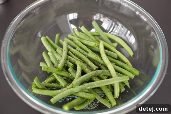 beans in a bowl with avocado oil, salt and pepper.