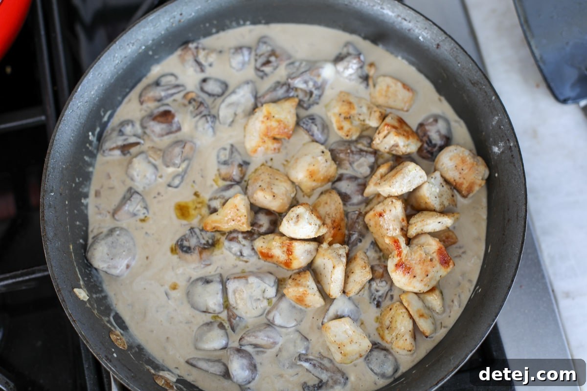 cooked chicken added back in the pan with the sauce. 