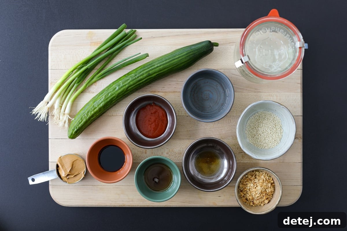 Ingredients needed for cucumber salad with spicy peanut dressing.