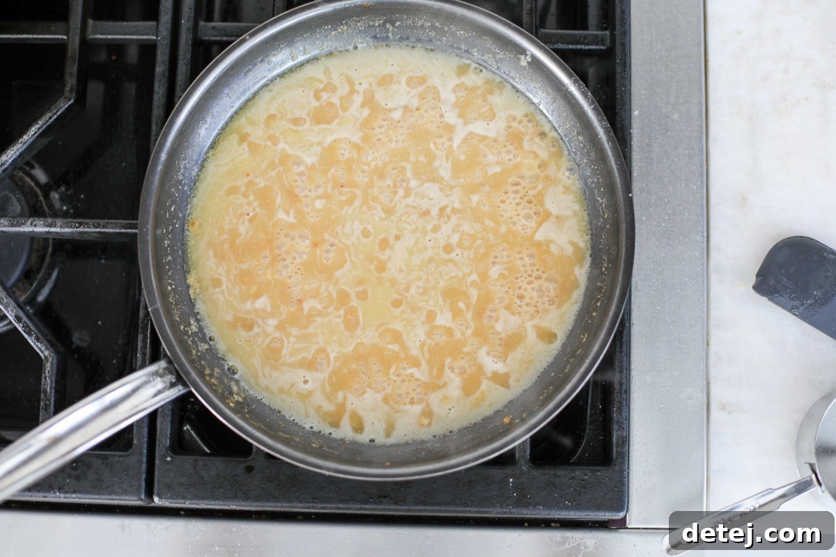 piccata sauce in a pan.