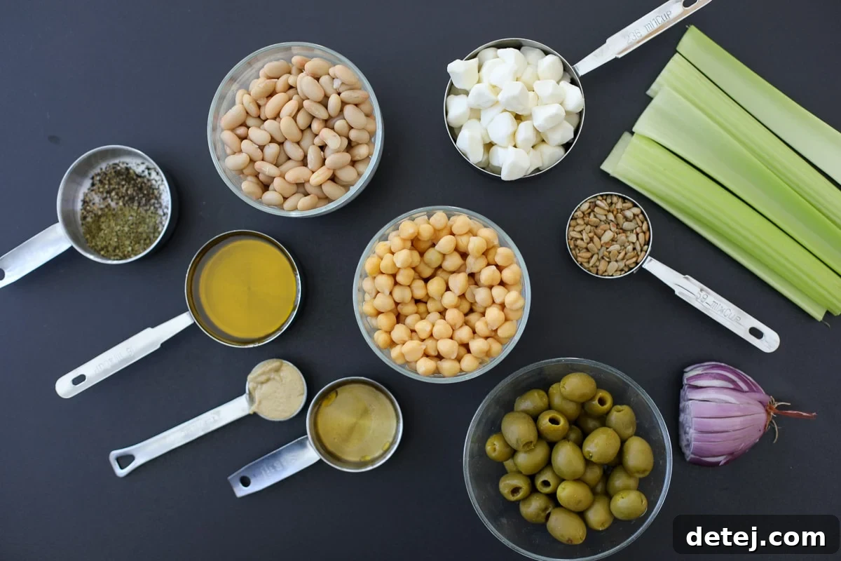 Vibrant Green Olive and Celery Bean Salad 3 Ingredients laid out for a delicious dense bean salad recipe.