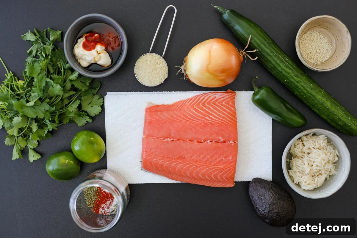 A vibrant display of fresh ingredients required for preparing spicy salmon burgers and all their delicious accompaniments.