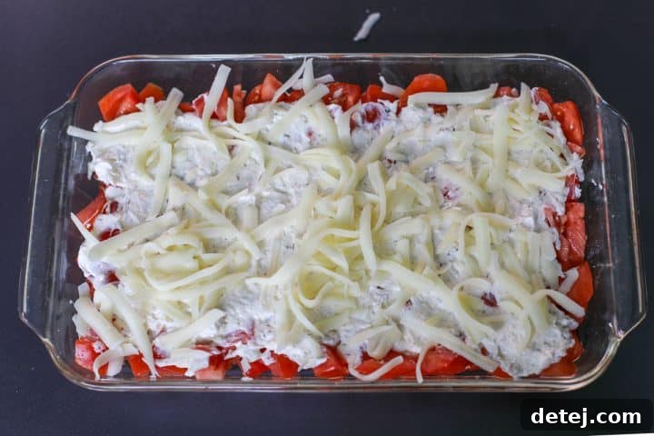 The assembled tomato pie dip ready for baking.