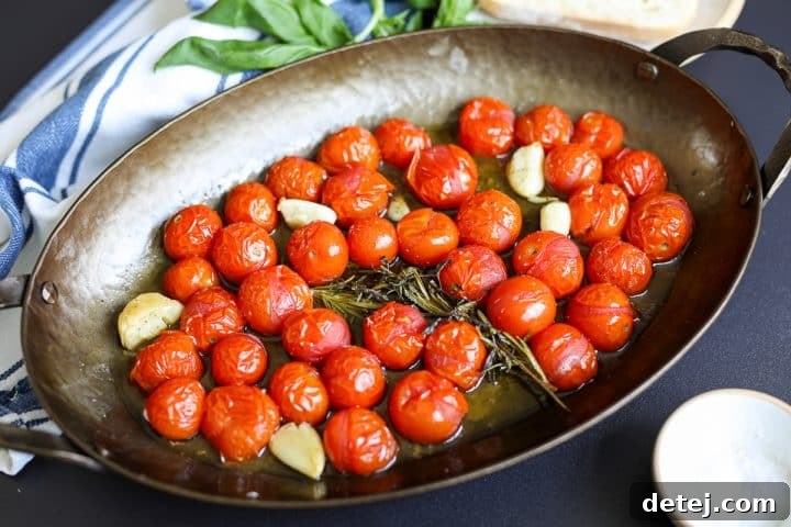 roasted tomato confit in a baking dish. 