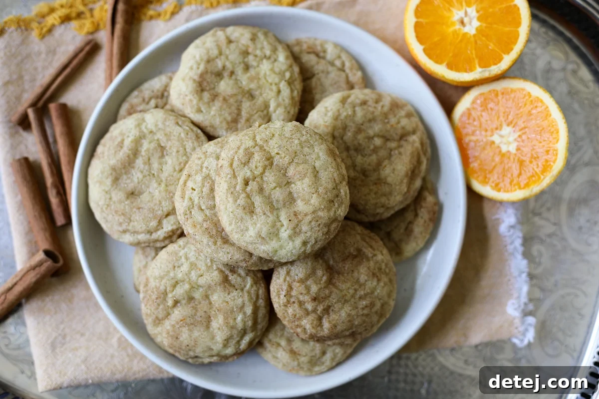 Delicious orange spiced cookies, fresh from the oven, celebrating a special occasion.