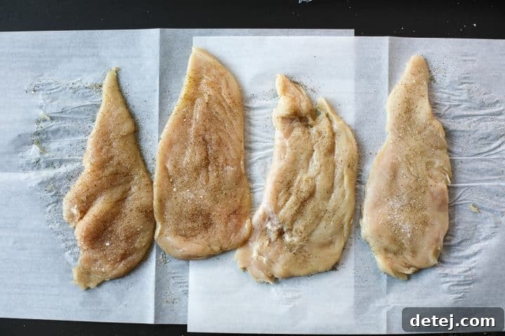 Agile Chicken Cutlets 5 Chicken cutlets seasoned with salt and pepper, ready for breading.