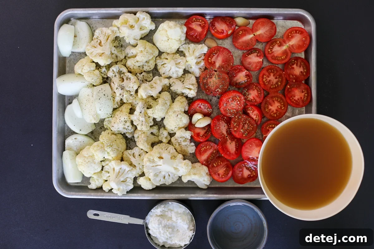 fresh vegetables laid out for creamy vegetable soup preparation.