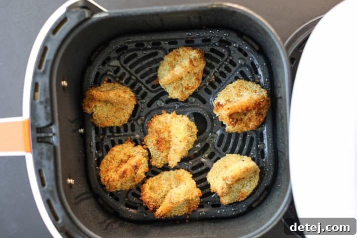 shrimp in air fryer basket. 