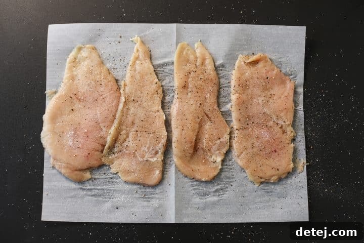 Ultimate Breakfast Chicken Cutlets 10 seasoned chicken cutlets, ready for the breading process.