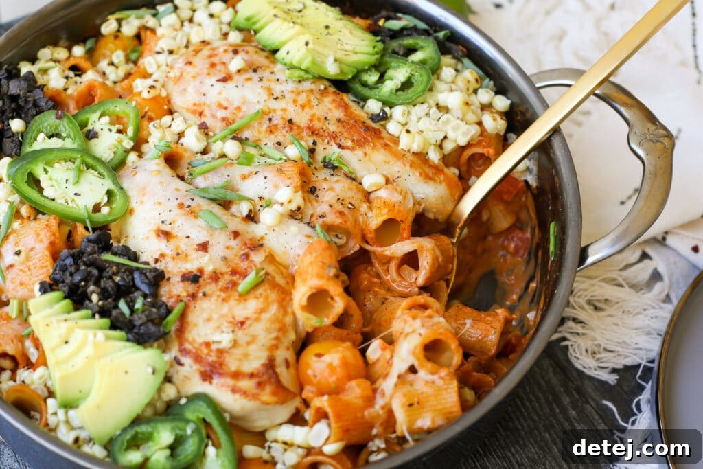 Creamy Chicken Enchilada Pasta – A quick and healthy weeknight dinner loaded with protein and fresh vegetables.