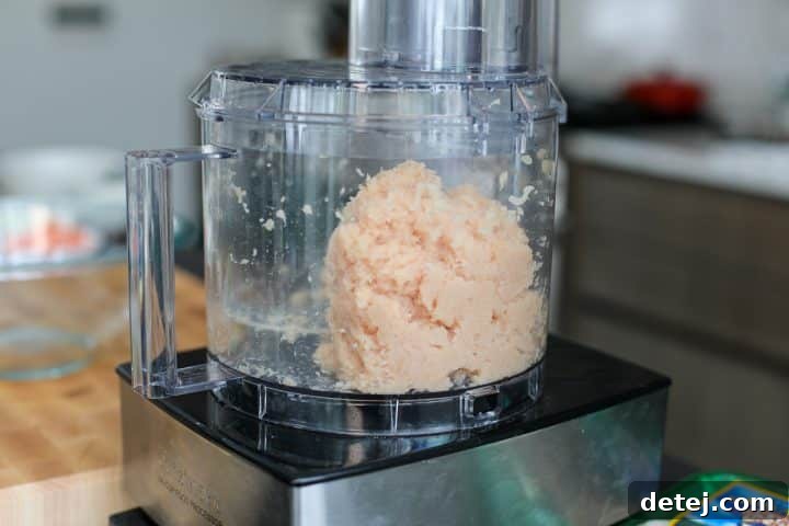Freshly ground chicken, ready for making meatballs.