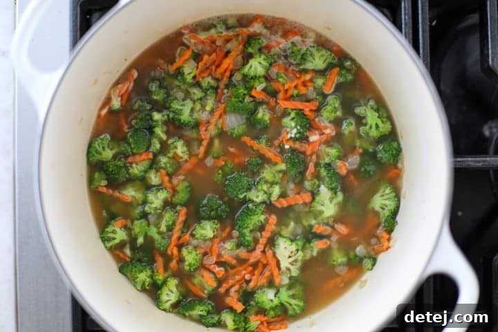 Soup simmering in a pot.