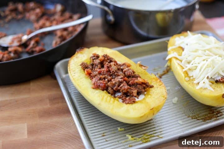 Rich beef mixture carefully layered into a spaghetti squash boat.
