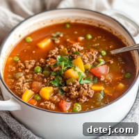 A bowl of delicious hamburger vegetable soup.