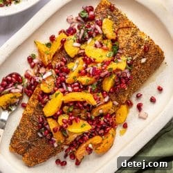 salmon on a plate. with citrus salad.