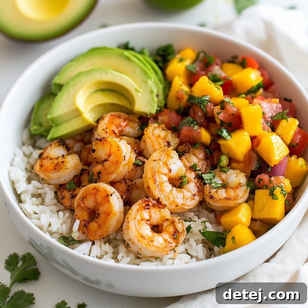 Beautifully Assembled Shrimp Avocado Bowl with Mango Salsa
