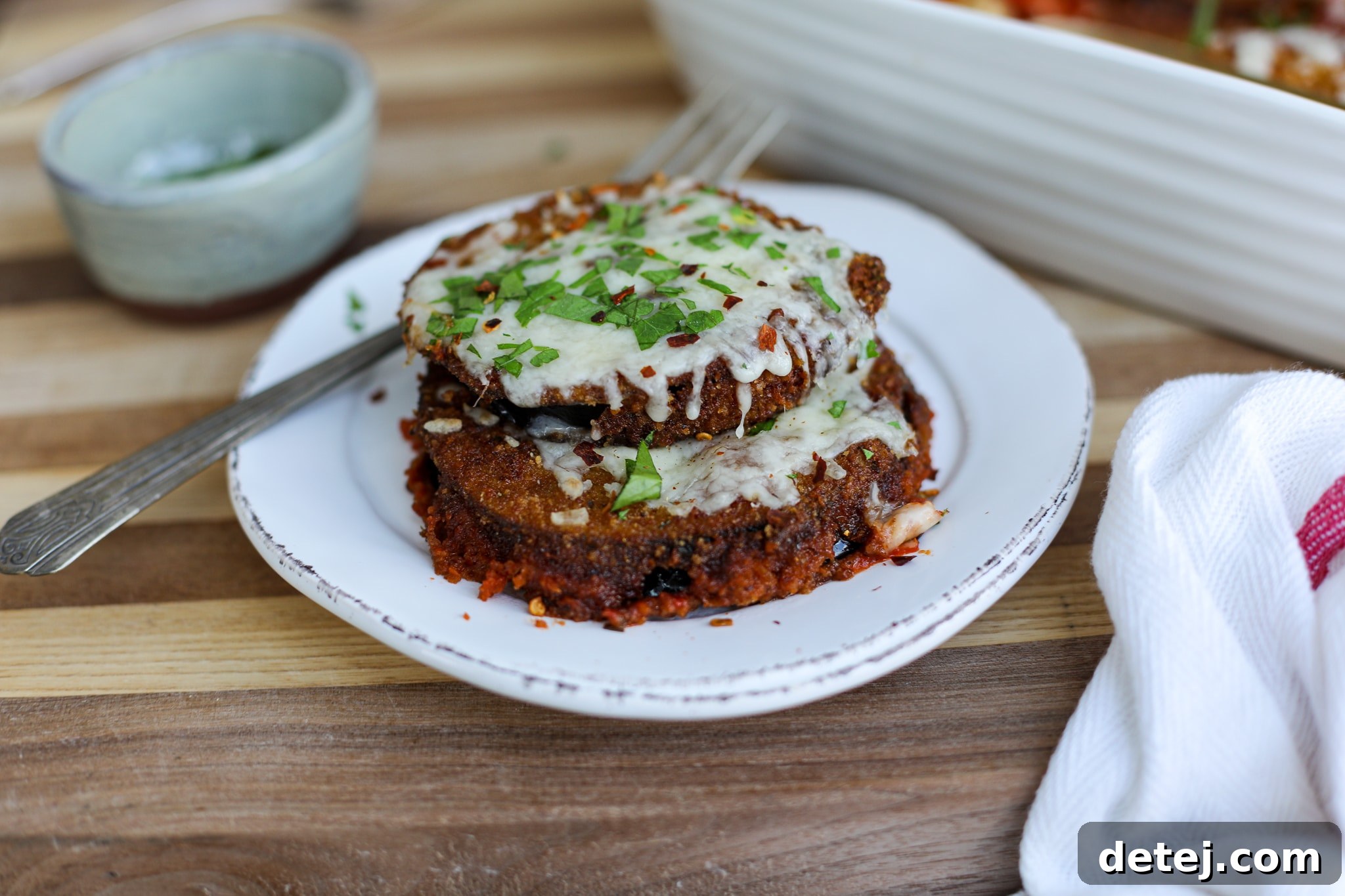 Sliced eggplant ready for salting in an Easy Eggplant Parmesan recipe.