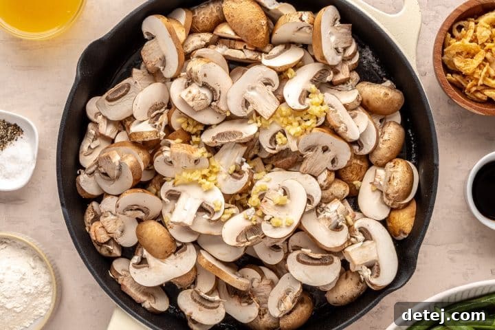 mushrooms and garlic in a pan.