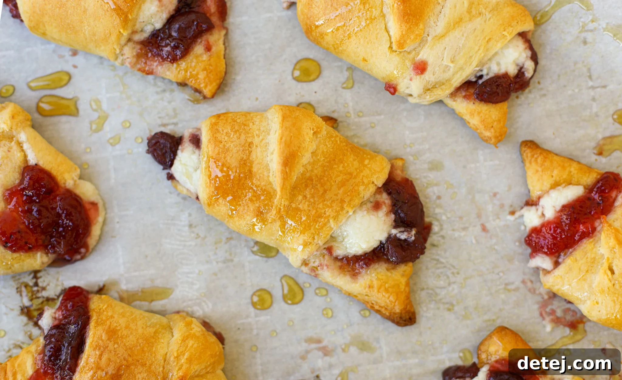 A close-up of the prepared cranberry and cream cheese fillings, ready for assembly.