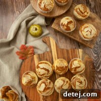 Pumpkin Cheesecake Swirl Muffins