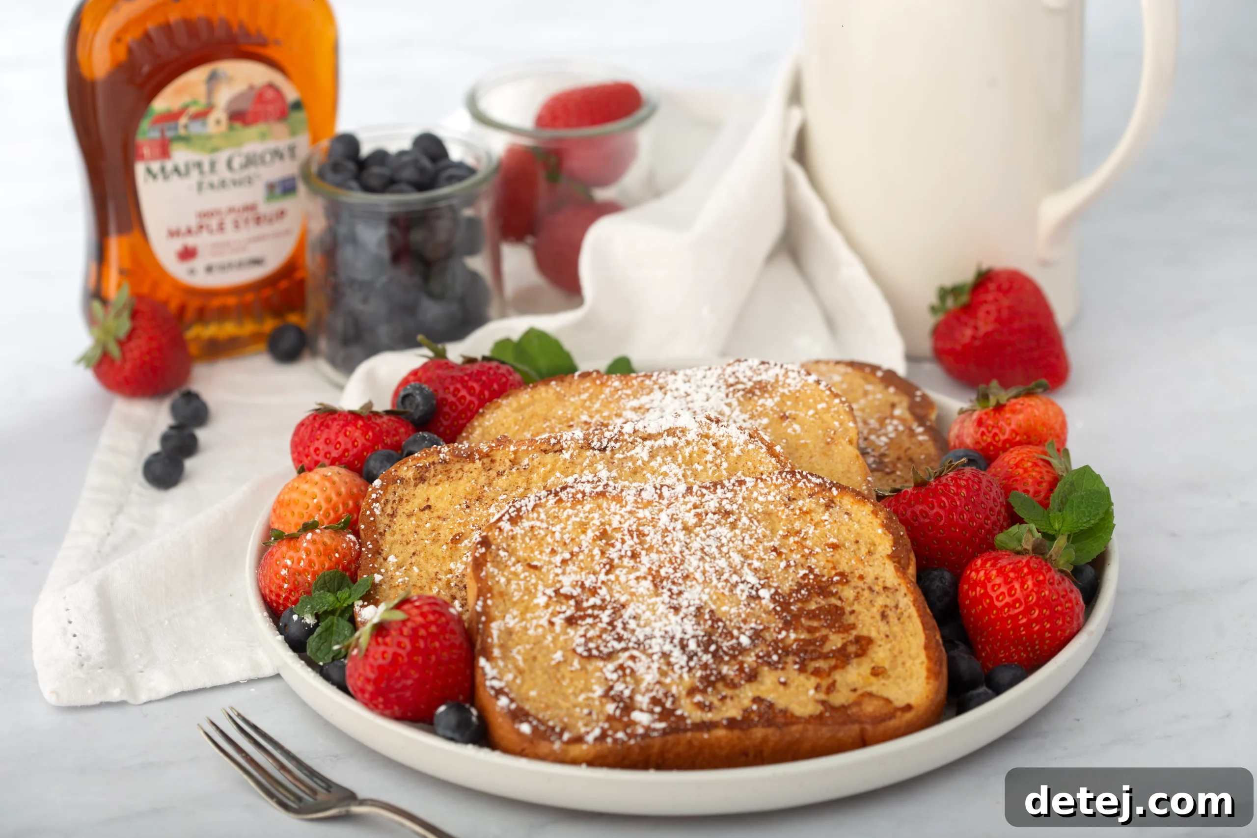 Perfectly cooked golden brown French Toast with a slightly crispy edge.