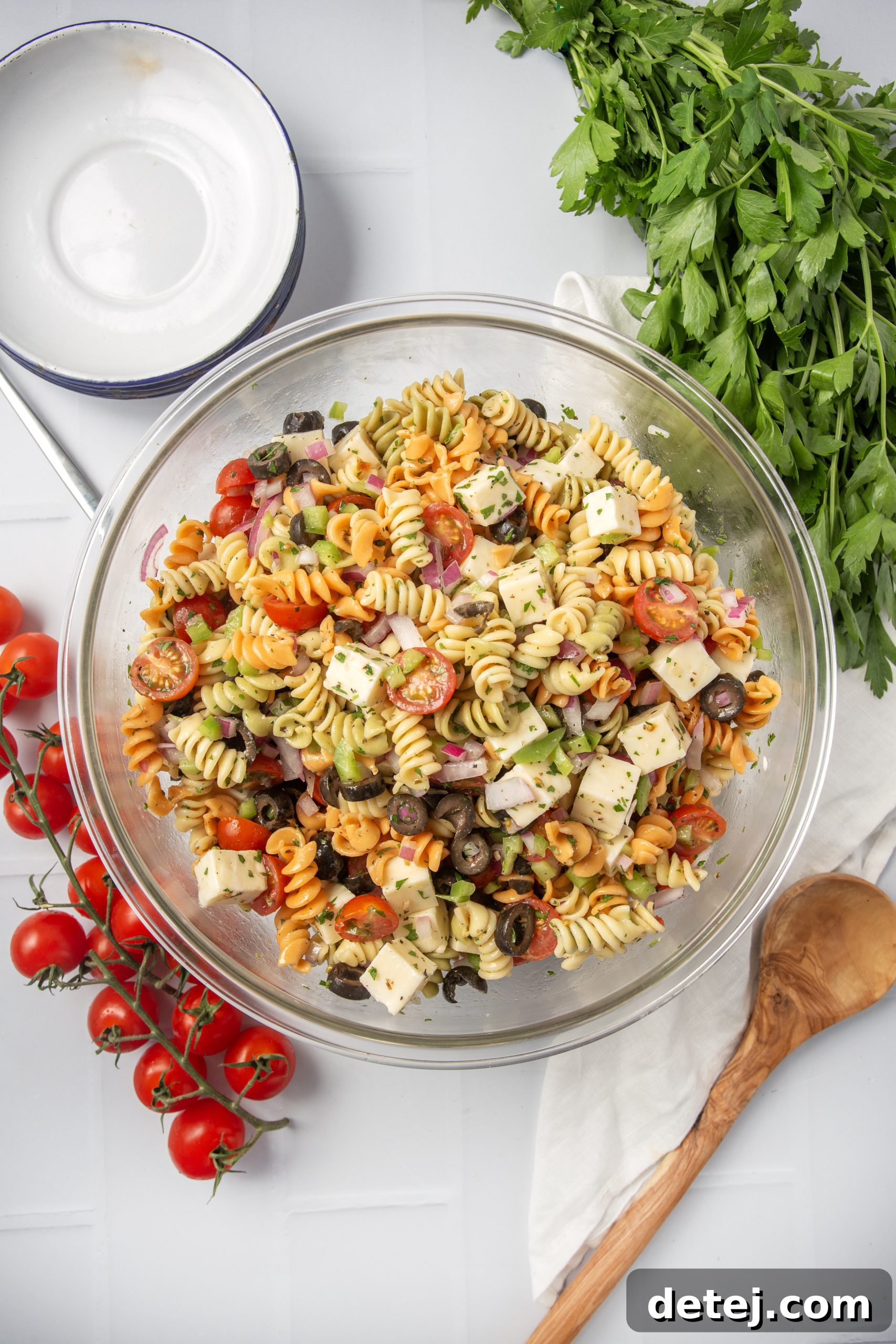 Vibrant Italian Pasta Salad 2 Vibrant Italian Pasta Salad with fresh vegetables and rotini pasta.