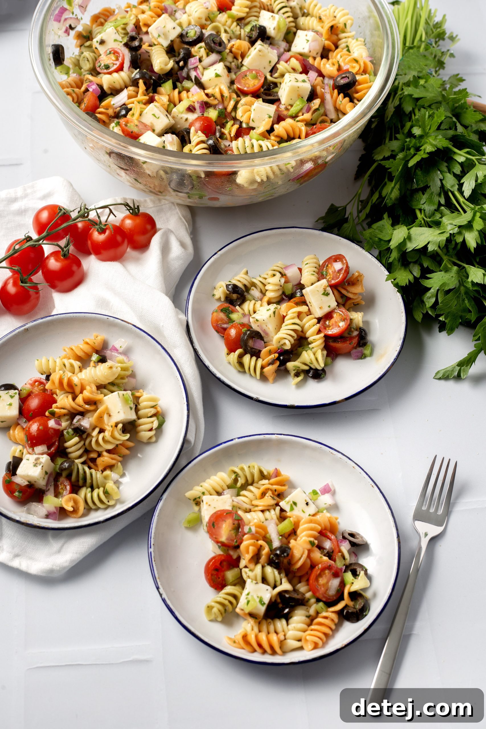 Vibrant Italian Pasta Salad 5 Fresh mozzarella pearls and diced mozzarella, ready for Italian pasta salad.